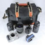 A Canon EOS Rebel XT camera, together with assorted lenses including an EFS 18-55mm and a 75-300mm