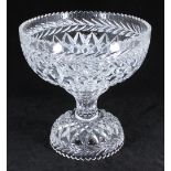 A large and heavy cut-glass centrepiece, possibly Waterford, of circular form with separate circular