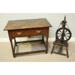 An 18th century oak side table of rectangular form, with single frieze drawer and brass handles,