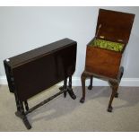 An Edwardian stained mahogany Sutherland table together with a stained walnut ladies workbox with