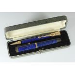 A Parker Duofold Jr. 'Lucky Curve' gilt metal mounted mottled blue lapis finish plastic fountain