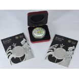 Two Britannia £2 silver coins, each 1oz of silver, together with a circular silver pill box