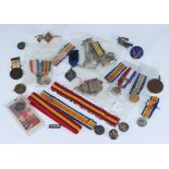 A small quantity of Boer War and WW1 miniature medals with numerous battle clasps, together with a