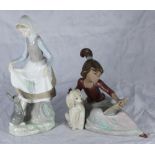 Two various boxed Lladro figures including 'A Lesson Shared' 12319 and 'Girl and Rabbit' number 4826