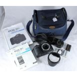 A Canon EOS 10D digital camera with instruction manuals, together with a Minolta 50mm lens and