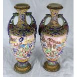 A pair of Oriental export porcelain twin-handled vases, of ovoid form, each decorated with scenes of