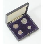 A cased set of Maundy money, 1907, in fitted box. Condition, uncirculated and with traces original