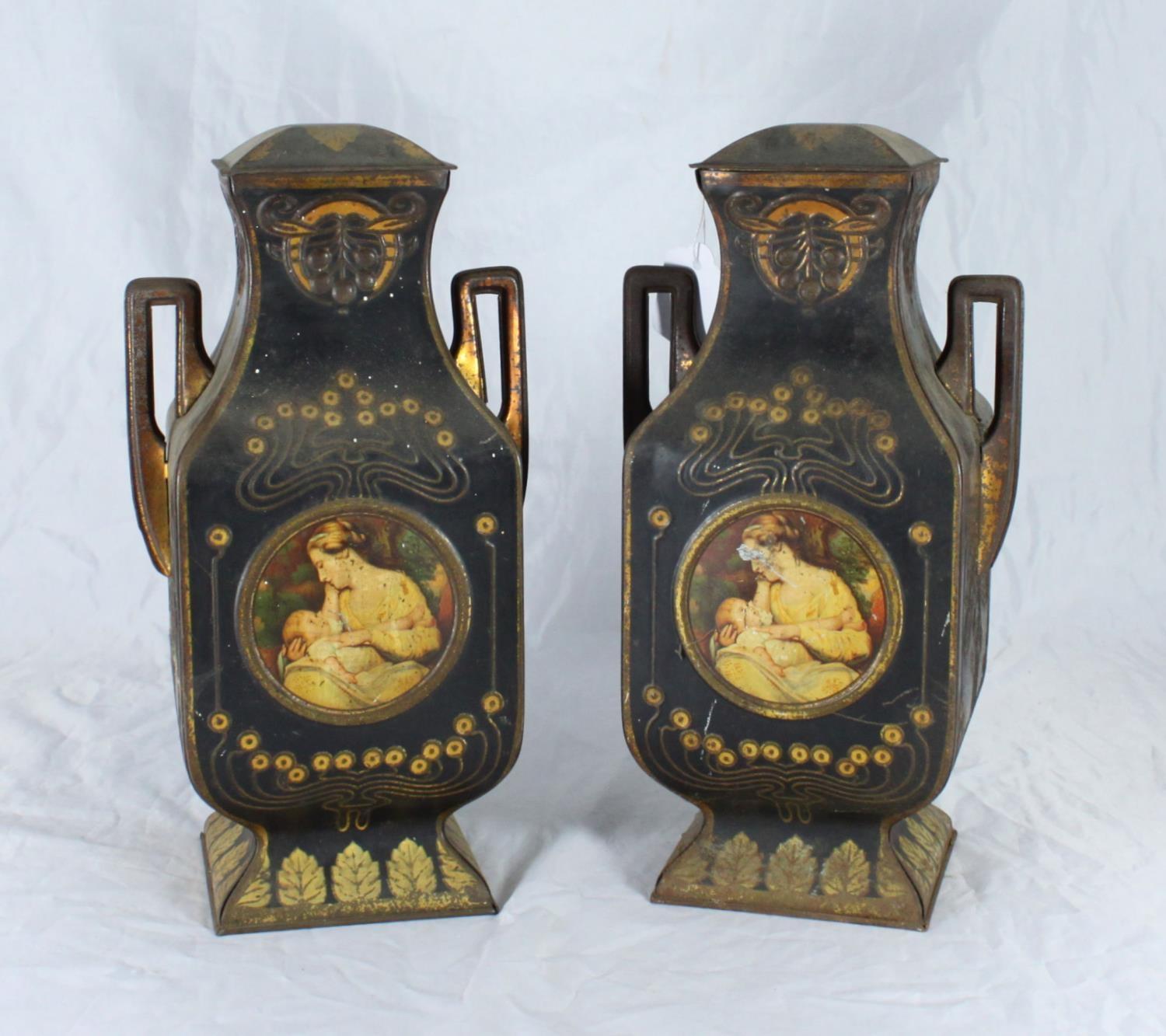 A pair of early 20th novelty confectionery tins for John Buchanan & Bros, modelled as a pair of