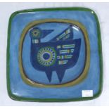 A mid-20th century Norwegian wall plate by Rolf Hansen, of square form, with stylised bird painted