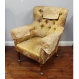 A Victorian exposed stained oak framed armchair with gold, floral upholstery, together with a