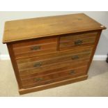 Edwardian walnut chest of two short and two long drawers with horizontal reeded fronts and brass