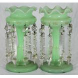 A pair of Victorian green opaque glass hanging lustre vases with gilded decoration, 25cm high