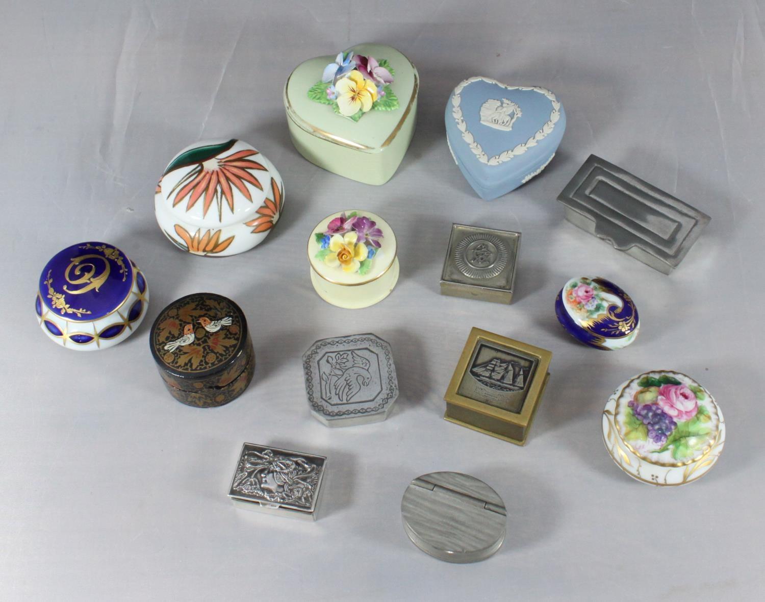 Fourteen assorted pill / trinket boxes including a white metal box stamped '835', Wedgwood