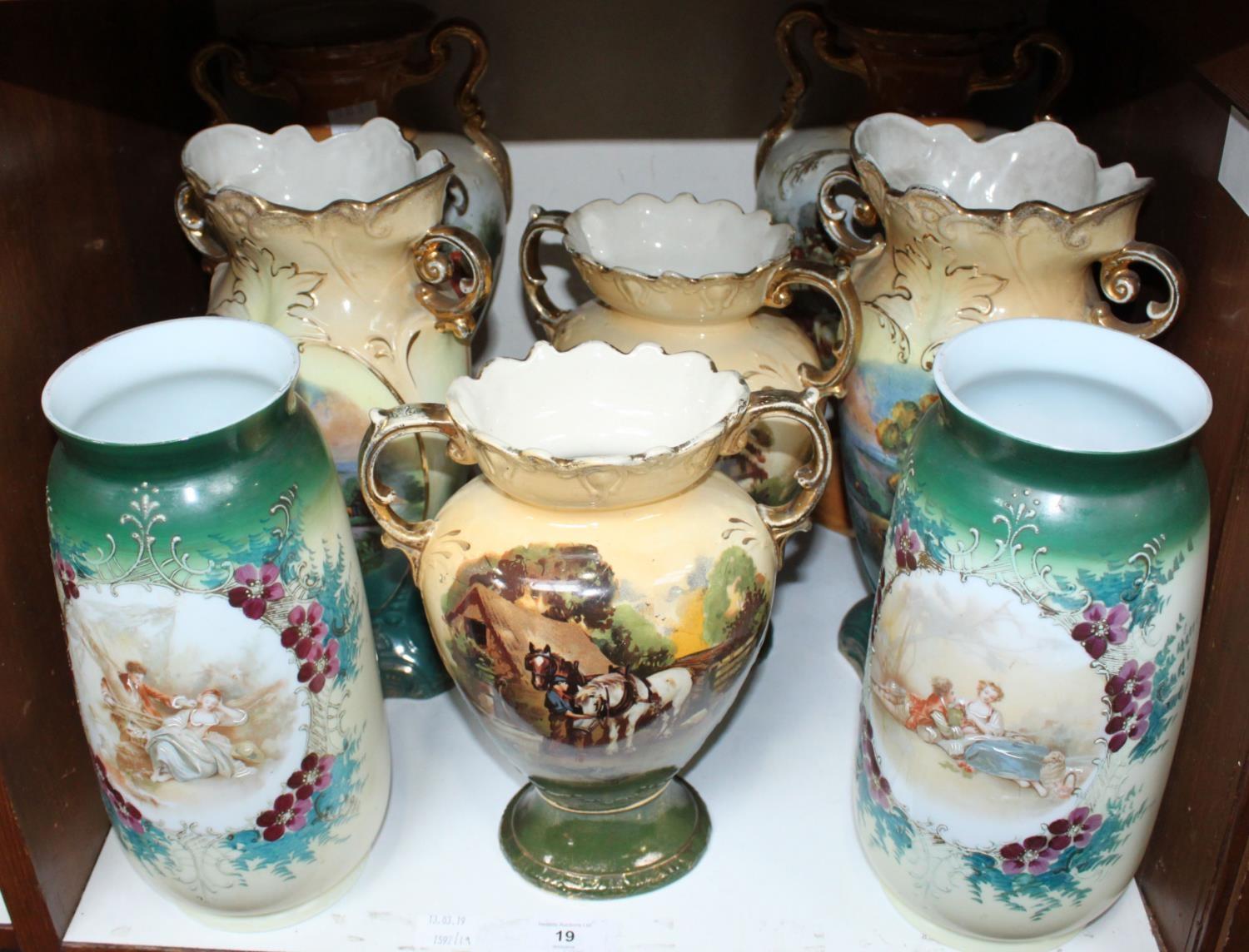 SECTION 19. Three pairs of Victorian pottery vases painted with various countryside scenes and a