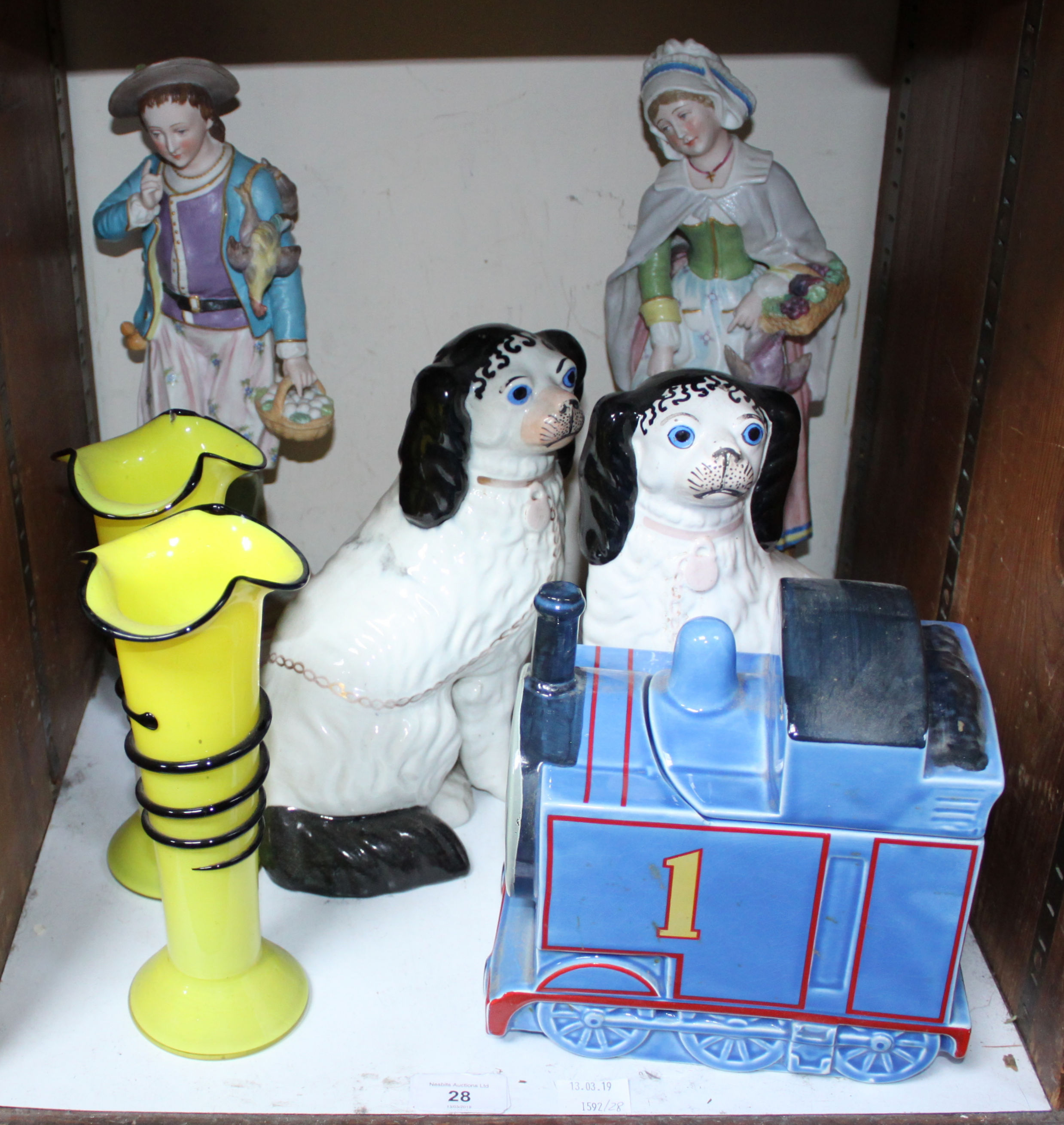 SECTION 28. A pair of Staffordshire seated spaniels, a pair of yellow and black glass vases, two