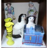 SECTION 28. A pair of Staffordshire seated spaniels, a pair of yellow and black glass vases, two