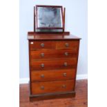 A mahogany chest of two short, over four long graduated drawers with brass ring pulls and flush