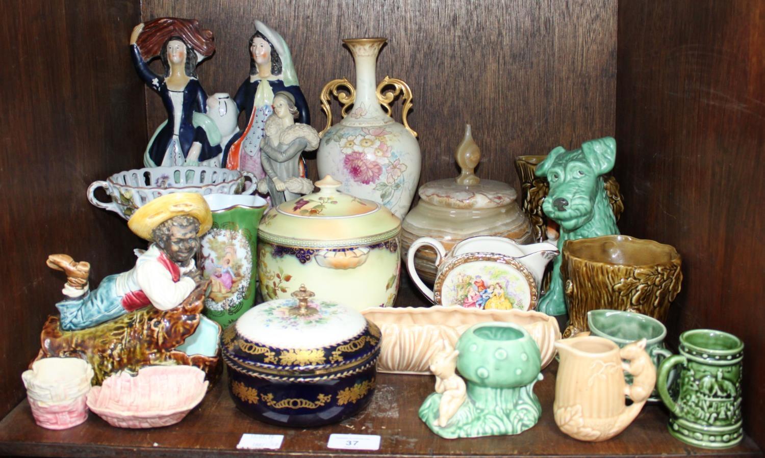 SECTION 37. A section of mixed ceramics including a Bernard Bloch style tobacco jar and match