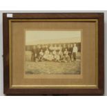 An original sepia mounted photograph of a circa 1898-9 Welsh football team, the mount signed S.J.
