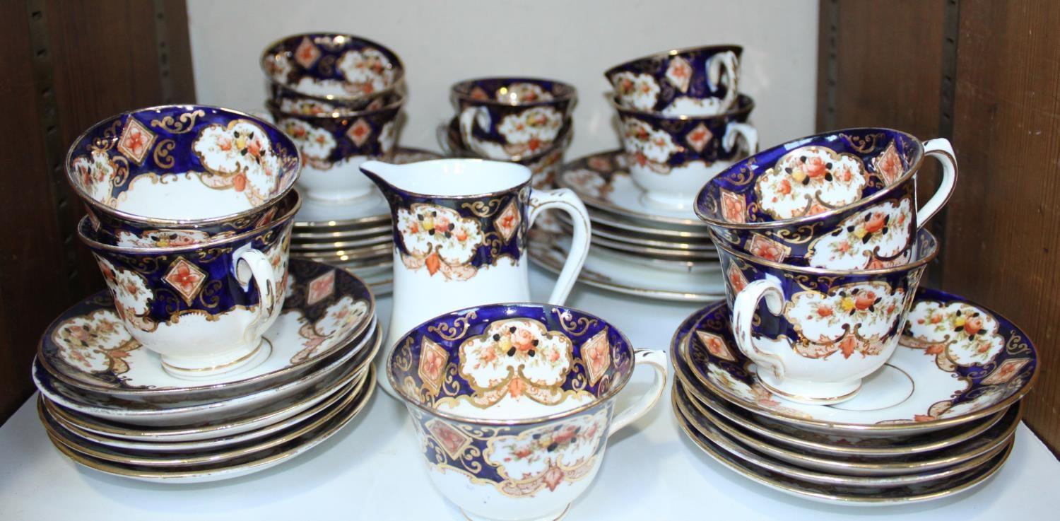 SECTION 21. A Royal Albert 'Japan' pattern part tea set comprising 2 x cake plates, 11 x side