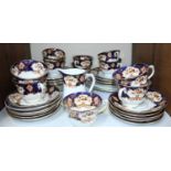 SECTION 21. A Royal Albert 'Japan' pattern part tea set comprising 2 x cake plates, 11 x side