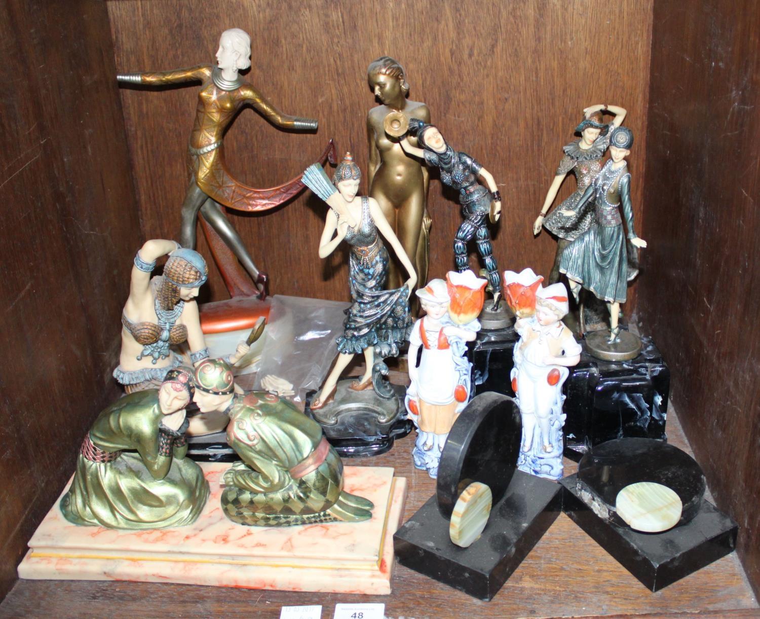 SECTION 48. Eight various Art Deco figurines together with a pair of black marble bookends and a