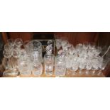 A collection of assorted glassware comprising five various decanters, a set of six Stuart wine