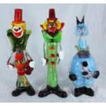 Three various large Murano glass clowns, one modelled as a decanter, the tallest approx. 35cm