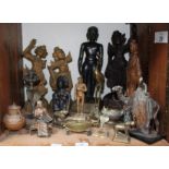 SECTION 29. A quantity of wooden carved Balinese style figures, together with some Oriental brass