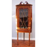 A Sheraton period mahogany and satinwood inlaid corner cabinet, with single astragal glazed door