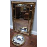 A rectangular mirror in ornate gilt frame, 83 x 53cm, together with a small circular convex mirror