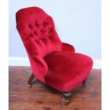 A button-back parlour chair in red velvet upholstery, raised on baluster front supports to