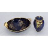 A Crown Devon Fieldings twin handled oval dish with coloured flowers and gilding to blue ground,