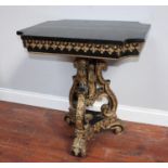 An early 19th century gilded and ebonised centre-table, the rectangular top with concave, canted