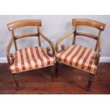 A pair of 19th century mahogany carver chairs with scrolled supports together with a set of four