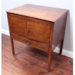 A 19th century stained mahogany night stand, of rectangular form with hinged top enclosing basin