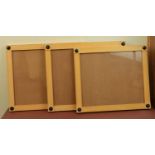 Three handmade faux birds-eye maple and ebony picture frames in the Biedermeier style, all with