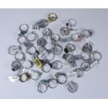 35 Gemporia white metal rings, marked 925 and with various semi-precious stones including topaz,