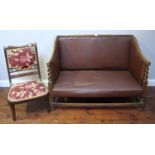 An Edwardian inlaid mahogany chair, with burgundy floral fabric upholstery, raised on squared,