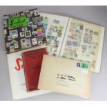 A small schoolboy stamp collection across two albums, including a Stanley Gibbons 'Swiftsure'