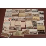 A collection of postcards, mostly real photographic, including views in Portsmouth, together with