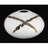 A large studio pottery stone vase of compressed globular form, decorated with an off-white glaze and