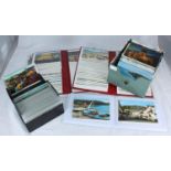 A collection of approximately 860 postcards across seven albums and two boxes, of topographical