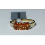 Gemporia yellow metal marked 10K ring set with topaz semi-precious stones