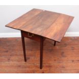 A 19th century mahogany drop-leaf Pembroke table, with single frieze drawer and opposing faux