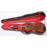 A 4/4 violin, whole back, no labels, with two full-size bows and wooden profile case