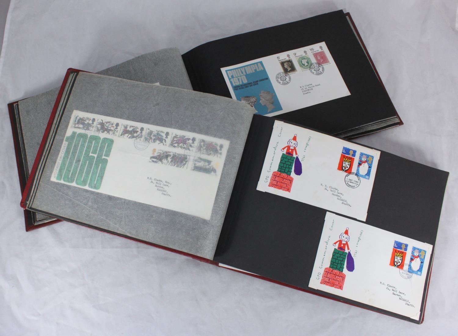 A collection of approximately 130 first day covers across two binders
