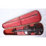 An unusual 4/4 violin with single piece mahogany back, replacement maple bridge by 'Aubert',