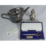 A silver sugar castor, Birmingham, 1933, makers mark TS, together with a cased pair of silver-