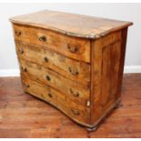 An 18th century Dutch or German parquetry walnut veneered inverted serpentine chest of four long
